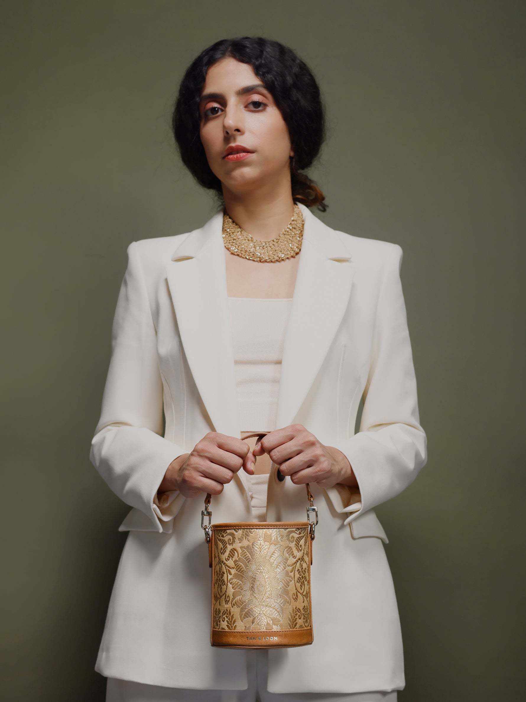 Handcrafted Golden Genuine Leather & Banarasi Brocade Cylinder Potli Bag for Women Tan & Loom