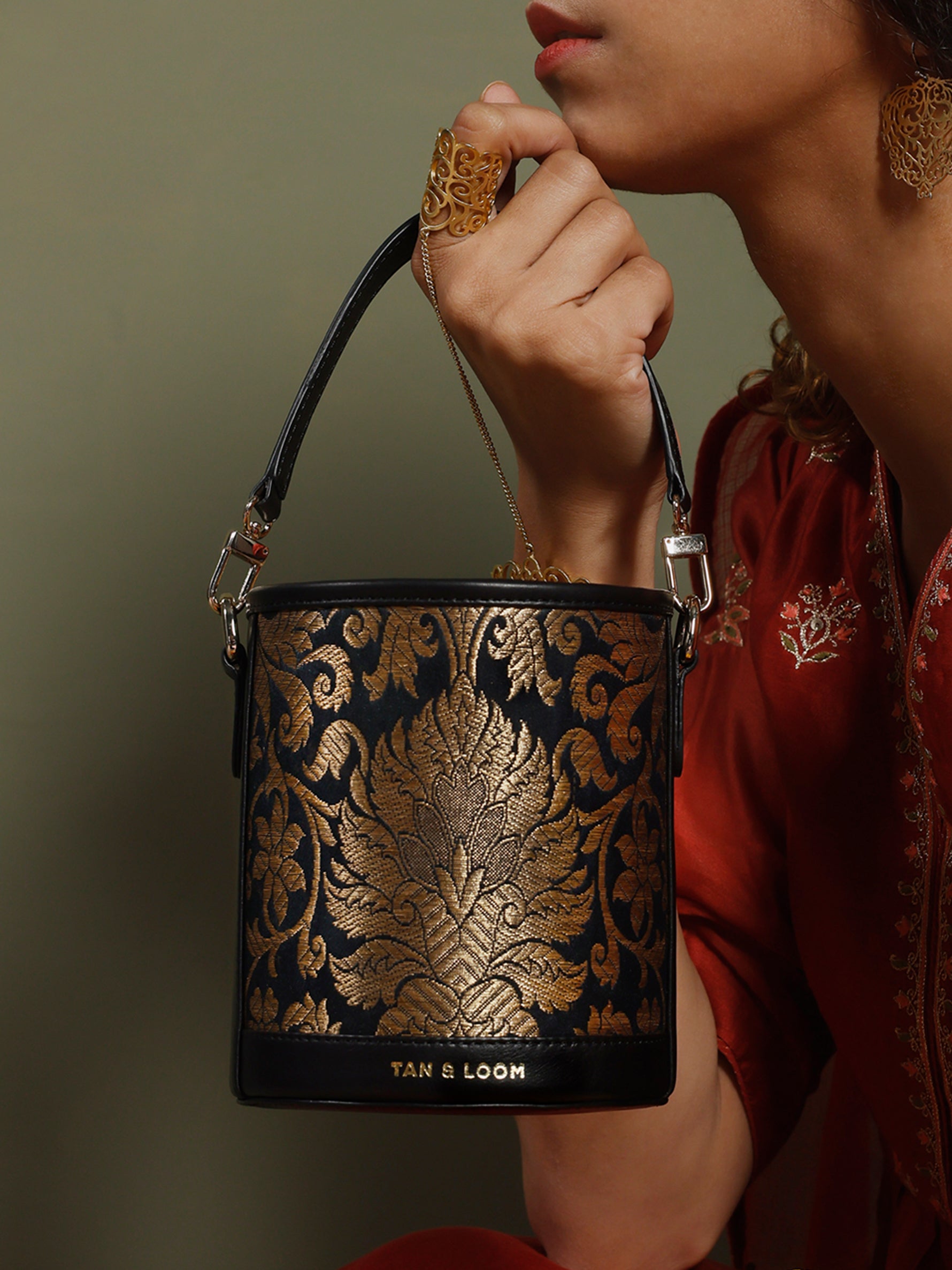 Handcrafted Black Genuine Leather & Banarasi Brocade Cylinder Potli Bag for Women Tan & Loom 